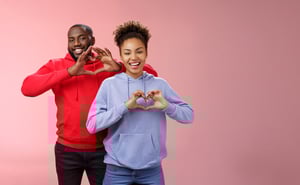 LP-charming-joyful-caring-young-african-american-family-man-woman-siblings-smiling-broadly-show-heart-gestures-grinning-express-love-empathy-positivity-two-loyal-friends-cherish-friendship